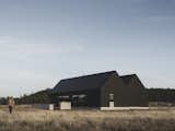 Exterior, House Building Type, Metal Roof Material, and Gable RoofLine Exterior in the spring  Photo 6 of 31 in Noir Peaks by The Ranch Mine