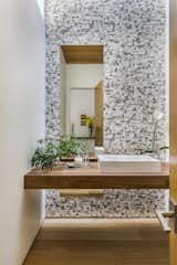 Bath Room, Mosaic Tile Wall, Light Hardwood Floor, Vessel Sink, Wood Counter, and Recessed Lighting  Photos from Wildwood