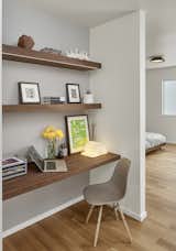 The office nook features a custom desk and shelf by Matt Eastvold