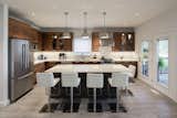 The kitchen island is a hub in the design.