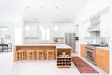 L-shaped island + teak cabinetry at open floor plan

[modern ranch home addition + renovation // sierra madre, california] 
