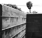 board-formed concrete at exterior courtyard wall

[north laguna contemporary cottage]