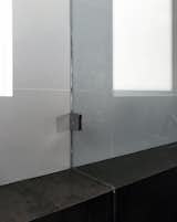frameless shower glass at white textured wall tile + mitered metal tile ledge

[modern bath remodel / orange, california]