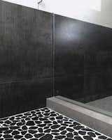 black, white and metal tile / modern master bath shower finishes

[modern renovation / orange, california]