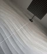 dimensional wall tile + square rain shower at midcentury modern master bath / orange county, california