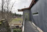 Owners collect all the rain from the roof into a 2600 gallon tank buried under the yard.