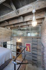 Create storage space wherever you can, then create a cool ladder to get there.