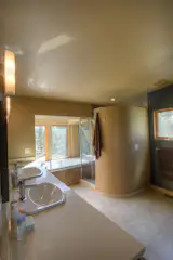 Tub has skylight above too.