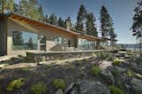The low wall provides additional seating for outdoor gatherings.
