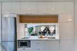 Honomobo H02 Kitchen. Efficient workspace, great storage. Luscious quartz countertop.