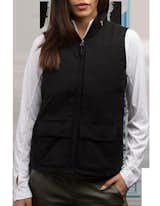 The Q.U.E.S.T. Vest for Women  packs an astounding 42 pockets, making it essentially a wearable carry-on bag. With this many pockets you are free to focus on your day, not where your stuff is (or isn't)

www.scottevest.com