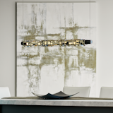  Light plays through the Transom LED Pendant. LED light sources bookend the light guide that rests at the core of the pendant. The inner and outer laser-cut tubes of steel create different patterns of light and shadow as they are turned. The pendant is offered with your choice of two-tone finish – one for the inner and one for the outer rings.

https://www.hubbardtonforge.com/products/139794