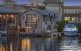Once a dark and dated nautical vibe, this renovated houseboat is now a sanctuary for its owner, with a fresh new contemporary craftsman aesthetic.

When Seattle native and luxury home builder Dean Jasper, of Dean Homes Inc. wanted a convenient and practical place to call home, he decided to take a somewhat unconventional route. By focusing on quality materials and thoughtful use of space, Dean now enjoys living in a home featuring abundant water views and a buoyant foundation near the Fremont neighborhood.
