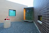 Exterior, Green Roof Material, Brick Siding Material, Glass Siding Material, and Flat RoofLine  Photos