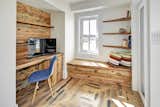 This office space also boasts reclaimed barn wood and features a built-in desk and storage tucked away under the built-in bench.&nbsp;