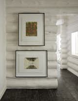 Alabaster tinted lacquer applied to all logs and plaster walls.