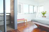 The master bedroom with a recessed balcony offers impressive views of San Francisco.