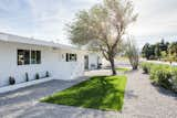 This sprawling ranch style home is drenched in California sunlight around the clock. A fresh coat of whitewash paint keeps it true to its original nature.