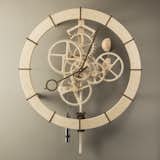 Walnut and baltic birch wall clock.  Outer dial 1200mm across. Weight driven 28 hour movement with moon phase sphere.