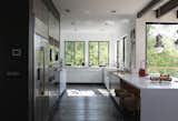 3K house kitchen has a strong sense of contrast from the many sources of natural light. 