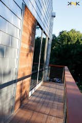 The balcony of the Master Bedroom, wraps around the second floor, west side and facade.