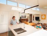 Pipeline LED light by ANDlight in Vancouver + Built-in fridge by Fisher Paykel