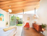 Master Bedroom with Western Red Cedar ceiling and clerestory windows that make the roof appear to be floating