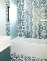 cement tile from Cle from floor to wall in the kids' bathroom