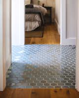 the tile blends into the floor seamlessly