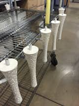 Six Prosecco Sconces await gold leafing by the talented craftspeople of Boyd Lighting.