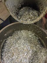 Remnant metal shavings are collected and recycled.