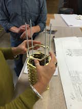 65 hexagonal plates make up each Solas Table Lamp which are assembled by hand in Colorado Springs.