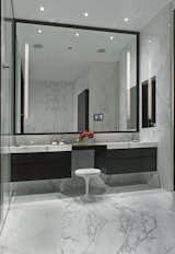 Designed to be recessed in a bathroom mirror as an unobtrusive, architectural light source, the Emanation Sconce also looks great surface mounted in dressing rooms, closets and hallways. Designed by Tony Garret for Boyd Lighting, this fixture has become the hottest selling fixture in our line. ADA compliant and available in five mirrored diffuser pattern options. Flourescent and LED versions available, Three standard lengths. #sconce #mirroredsconce #bathroomsconce #lighting