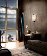Designed for maximum versatility, the Baguette Sconce is named after the jewel cut of it's faceted diffuser. It  can be configured in sparkling crystal-like glass or creamy, veined natural alabaster with or without a secondary ribbed diffuser. It is aggressively priced, and ADA compliant so it is a versatile fixture for residential, commercial and hospitality spaces. Available in four metal finish options. #sconce #livingroom #livingroomsconce #livingroomlighting #lighting #alabaster #stone