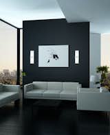 It is virtually impossible to capture the effervescent beauty of this large LED sconce, but the name says it all. The architectural Tonic Sconce by NYC designer David Nosanchuk for Boyd Lighting "fizzes" with drama, and its low profile and energy efficient lamping makes it a smart choice for residential, commercial and hospitality projects. #livingroom #livingroomlighting #sconce #livingroomsconce #glasssconce #glasslighting #lighting #whitelighting