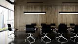 The linear T-Light Pendant features parallel pieces of extruded aluminum that hang from two stems and sandwich a ¾” thick piece of etched, water white glass and form an upside down “T”. Two strips of 3000˚K LEDs provide warm up and down-light and are wired as dual circuits, which allows each light source to be dimmed separately. Once hung, each of the two stems can be adjusted independently to level the pendant. The T-Light comes in a myriad of standard powder coat finish options:  Cinnamon Bronze; Rubbed Bronze; Silver Fog; Black Granite; Gossamer Aluminum; Gloss White; Golden Gate Orange; and Coffee Bean. 12 specialty powder coat options available. Available in 5’, 6’ and 7’ lengths. #lighting #commerciallighting #conferenceroom #conferenceroomlighting #pendant #LED #office #officelighting #architecturallighting