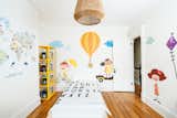 Children's bedroom: playful fabric decals enliven a historic room