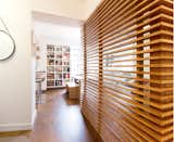Entry hallway  - the teak screen offers privacy to the office space