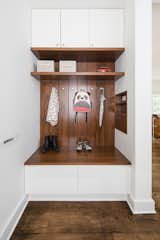 Compact mudroom off the front entry offers storage and recessed drawers for mail and all the things you'll likely to lose (including your keys!) 