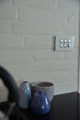 The slim line light switch in Pure White from the Clipsal Saturn range were chosen to blend in with the surrounding area.