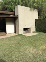 One of the multiple outdoor fireplaces used year-round for entertaining guests.

#schindlerhouse #losangeles #concrete #fireplace  Photo 8 of 8 in An Experiment of Form in West Hollywood
