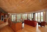 Prefabricated round home by Deltec Homes #deltechomes #prefab #openconcept #openfloorplan #netzero #roundhouse #modern