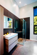 Bath Room, Concrete Floor, Corner Shower, Enclosed Shower, and Recessed Lighting  Photo 6 of 7 in The Desjardins Residence by BONE Structure