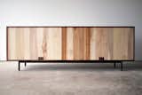 Credenza back panel - mixed salvaged pallet wood with sliding walnut cord hatches. 
