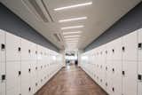 The changes in material on the floor have the particularity of entering and/or leaving spaces as an indicator so that users quickly identify what they are going to find behind a door or what function the place they are going to enter has. 
