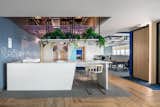 The changes in material on the floor have the particularity of entering and/or leaving spaces as an indicator so that users quickly identify what they are going to find behind a door or what function the place they are going to enter has. 
