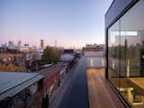 Exterior, House Building Type, Brick Siding Material, Metal Siding Material, and Flat RoofLine View of city from roof terrace.   Photo 9 of 15 in Black Metal Steels the Show at This Renovated Live/Work Space in Toronto from House Studio
