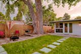 Behind the house is additional space for entertaining.