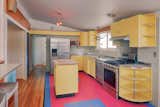 The kitchen features a beautiful vintage set of Youngstown steel cabinets.
