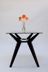 Kitchen table with black empire glass top.